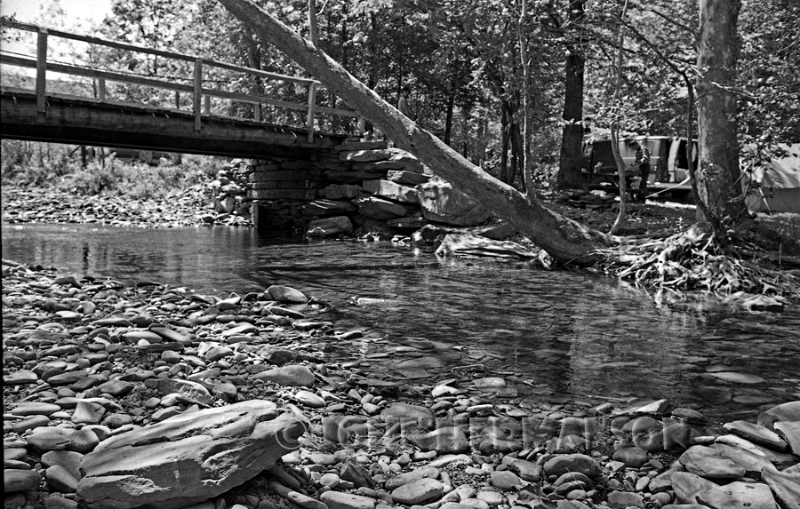 Site_22_5_77.jpg - Site 22 from across the creek, my Ford van, May of 1977. 